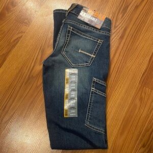 Brand new. Woman’s Size 25 R mid rise straight